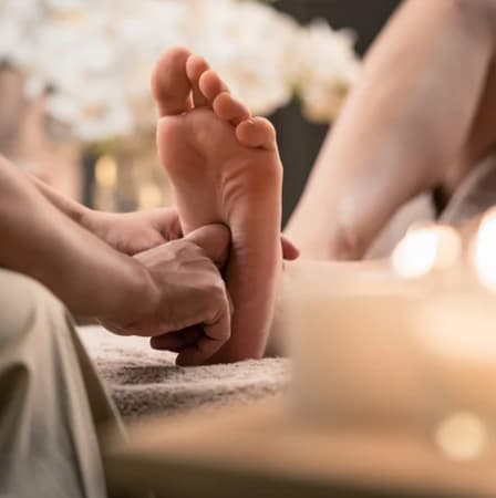 Foot reflexology massage treatment